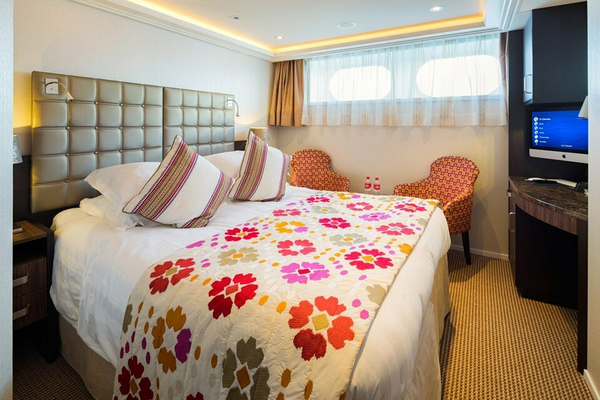 AmaWaterways AmaFiora Category D Stateroom Bedroom WEB.png